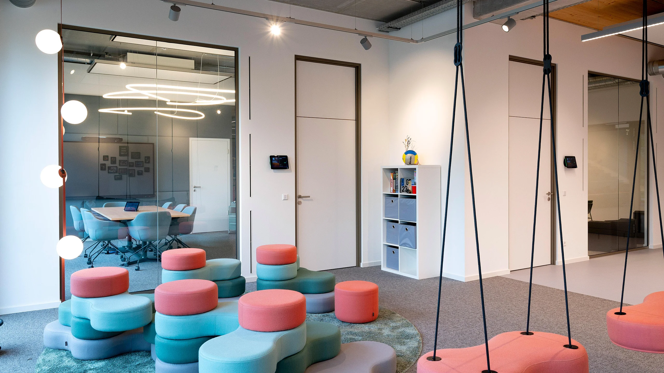 Floor-to-ceiling wooden doors with a fixed upper panel