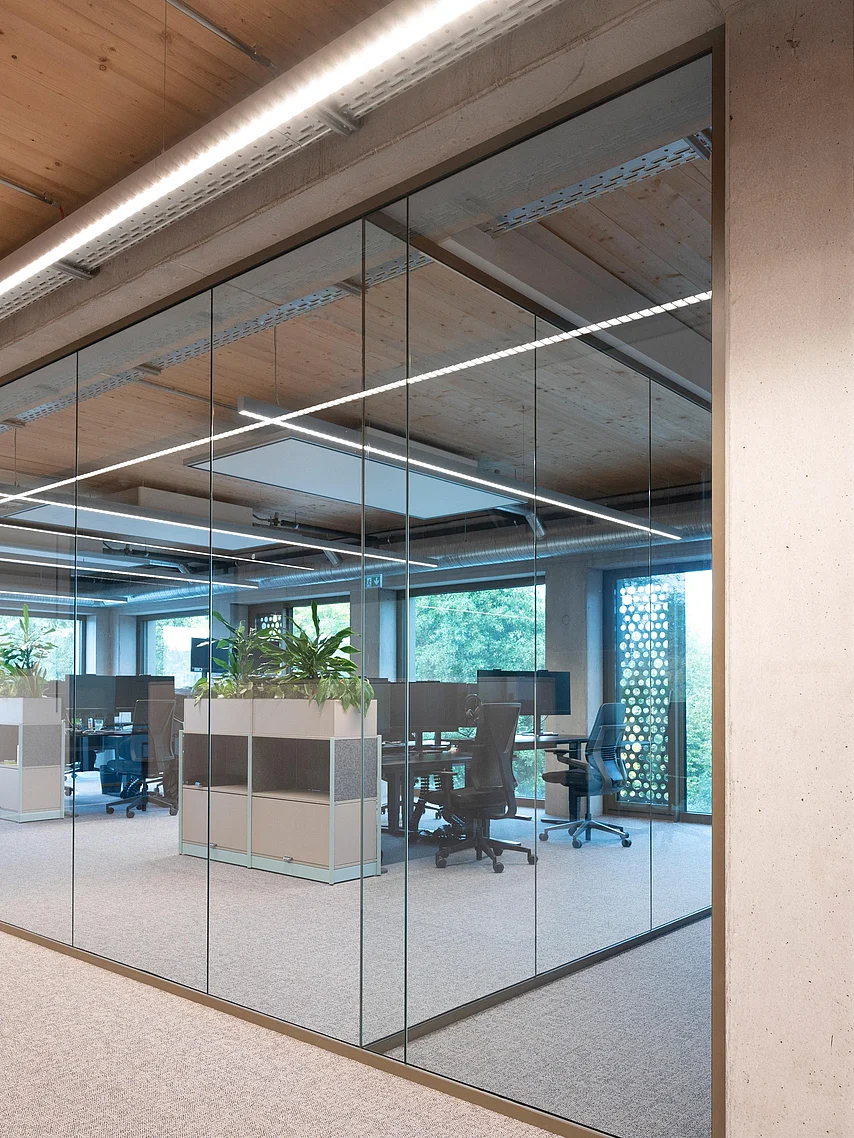 Floor-to-ceiling single-pane glazing